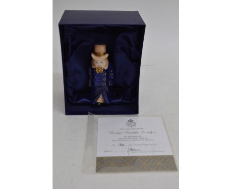 A Royal Worcester candle snuffer with certificate and box