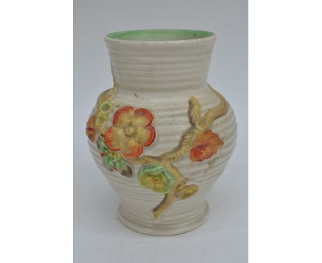 A Clarice Cliff Vase No 912 decorated with orange and yellow flowers