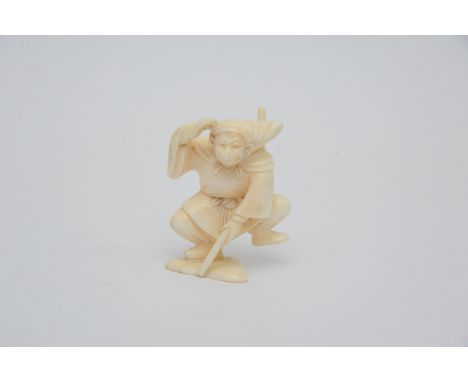 A Carved 19th Century Japanese Ivory Netsuke figure in the form of a dancing figure