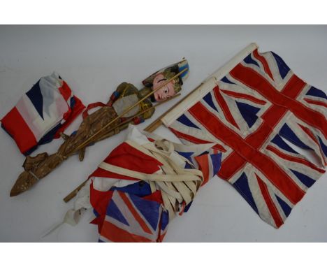 Two small vintage Union Jacks, bunting, and stick stick puppet