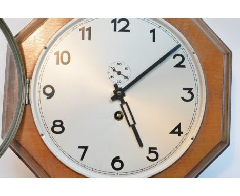 A small octaganol wall clock