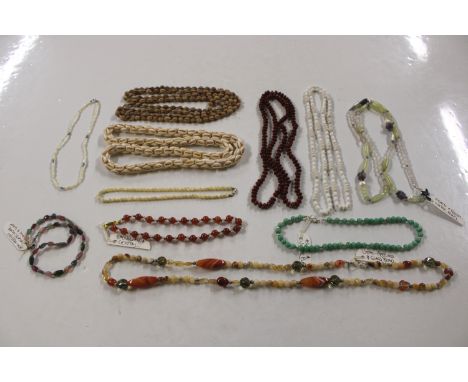 A box of various semi-precious bead necklaces; mother of pearl necklaces; various other bead necklaces etc.