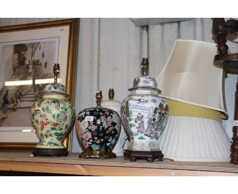 Three Oriental table lamps and a white glazed table lamp