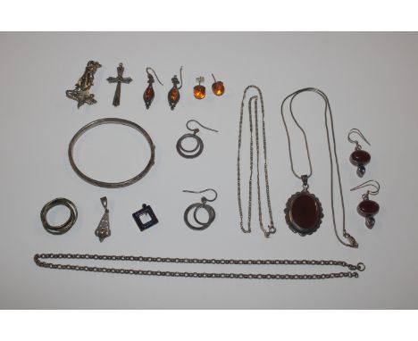 A box of jewellery including silver bangle, brooch , ear-rings etc.