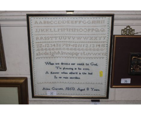 A framed sampler by Alice Garrett 1850, aged 8