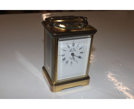 A French brass cased L'epee carriage clock