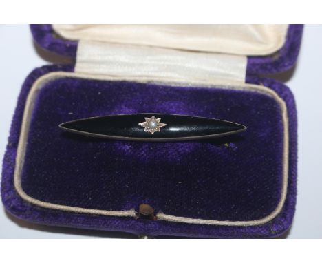 An antique Sterling silver and seed pearl mourning brooch 