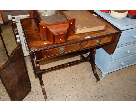 A mahogany cross banded sofa table 