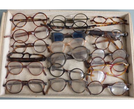 Nineteen pairs of faux tortoiseshell and similar vintage spectacles, circa 19th century and later, including one pair with un
