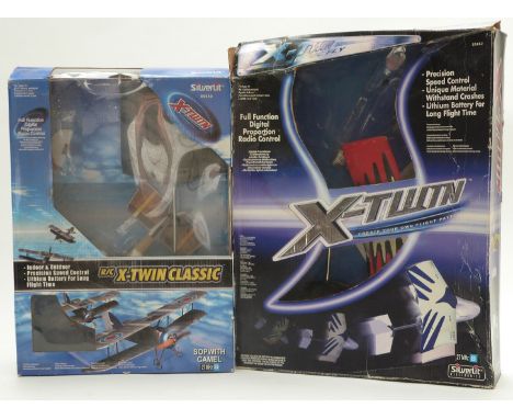 Two Silverlit X-Twin radio controlled model aeroplanes, both in original boxes.&nbsp;