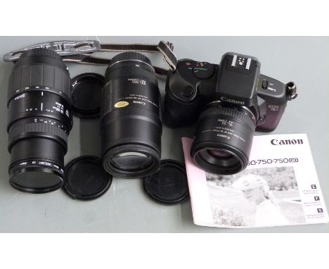 Canon EOS 750 SLR camera with Canon zoom lens EF 35-70mm 1:3.5-4.5A, Canon zoom lens EF 100-200mm 1:4.5A, Sigma 70-300mm 1:4.