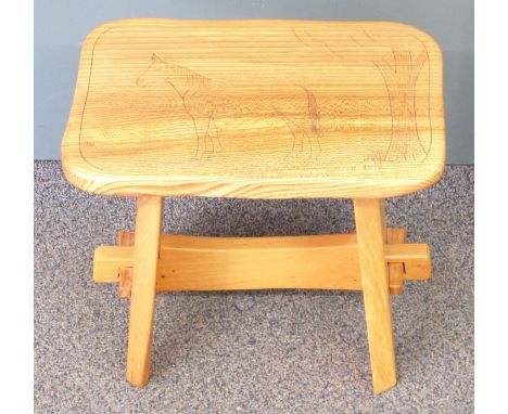 Peg jointed light elm side table / stool with pokerwork horse decoration and a brass four-division stick stand, tallest 60cm