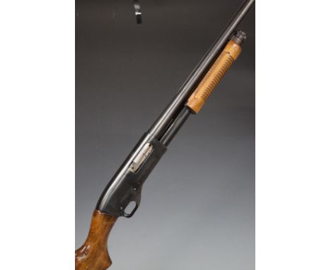 Magtech Model 586 pump-action shotgun with 26 inch barrel, overall length 117cm, length of pull 35cm, serial number 91216.&nb