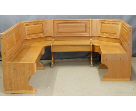 An oak semi-circular seating arrangement / dining bench with underseat storage, dimensions when arranged approximately 2M x 2