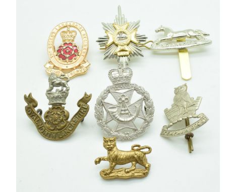 Six British Army metal badges including hallmarked silver Officers Light Infantry, Yorkshire Regiment, Loyal North Lancashire