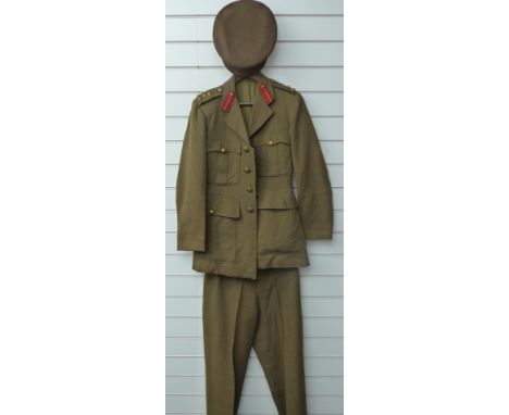 Two British Army uniforms khaki and 'blues' both with Cheshire Regiment buttons and Brigadier rank and insignia, with cap ini