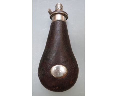 G &amp; J W Hawksley leather covered metal powder flask with engraved cartouche, 20cm long.&nbsp;