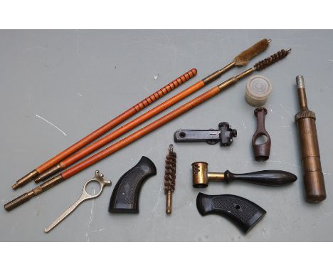 A small collection of gun tools and accessories including a spring loaded brass oiler stamped 'Brit. Pat. Nos 218639-230903 R