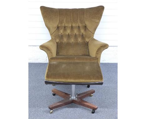 Retro G Plan upholstered button back armchair and matching footstool raised on X frames and metal castors, W92 x H101cm