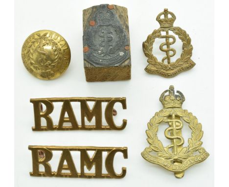 British Army four Royal Army Medical Corps metal badges including a pair of shoulder titles, together with Corps Unit stamp a