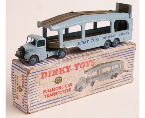 Two Dinky Toys diecast model vehicles Pullmore Car Transporter 582 and Army Scout Car 673 both in original boxes together wit