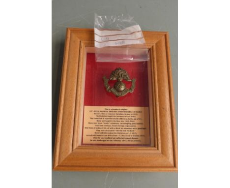 British Army WW1 25th Royal Fusiliers Frontiersmen cap badge, framed and mounted