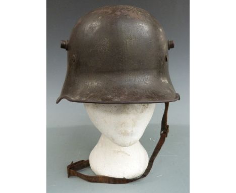 German WW1 M16 steel helmet with padded liner and leather chin strap