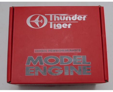 Thunder Tiger GP42 model aircraft glow engine in box, together with a GP7 engine and an Irvine 25 engine