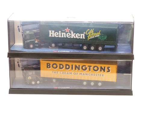 Two Corgi 1:50 scale diecast model lorries Boddingtons 75202 and Heineken 75404, both in original display cases.