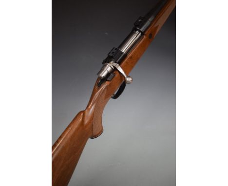 Parker-Hale .308 bolt action sporting rifle with chequered semi-pistol grip and forend, raised cheek piece, adjustable pop-up