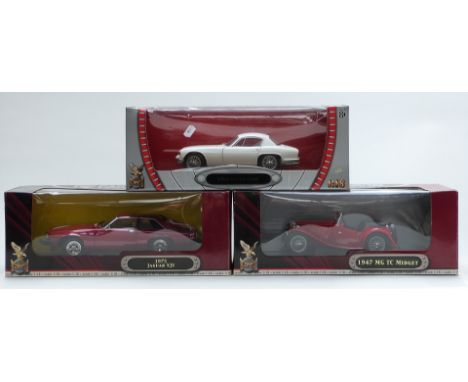 Three Road Signature 1:18 scale diecast model vehicles comprising two Deluxe Edition 1947 MG TC Midget 92468 and 1975 Jaguar 