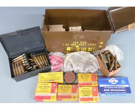 A collection of various calibre collectable ammunition, some in original boxes, all in a vintage military ammunition carrier&