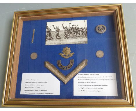 British Army WW1 silver war badge cap, badge and shoulder title for the Worcestershire Regiment etc, in glazed display case&n