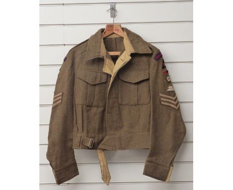 British Army WW2 battledress tunic with Royal Artillery insignia and Staff Sergeant rank to sleeve, internal label dated 1941