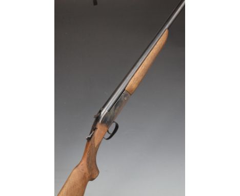 AYA Cosmos 12 bore single barrelled shotgun with chequered semi-pistol grip and forend and 30.25 inch barrel, overall length 