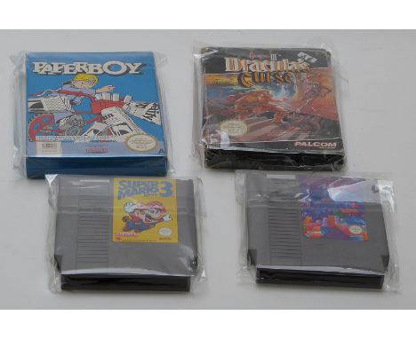 Four Super Nintendo Entertainment System (SNES) video games console games Super Marios Bros 3, Tetris, Castlevania III Dracul