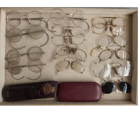 Five pairs of vintage spectacles, thirteen pairs of clip on spectacles and a cased W.Gregory pair of opticians test spectacle