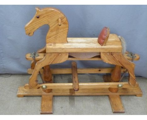 A wooden rocking horse, H75cm