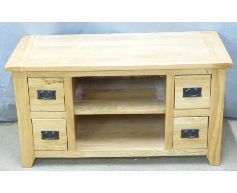 Contemporary light oak cabinet with four drawers and cubby holes, W110 x D50 x H60cm