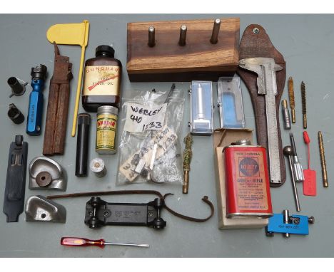 A collection of gun parts, accessories and tools including over and under pistol barrels, air rifle parts, scope mounts etc, 