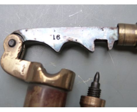 Two brass shotgun cartridge reloading tools comprising a 12 bore rollover tool and a 16 bore capper/ decapper, both with turn