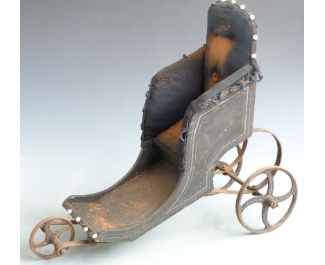 Victorian upholstered dolls' bath chair with cast iron wheels, button back fabric, sprung suspension and ceramic stud decorat