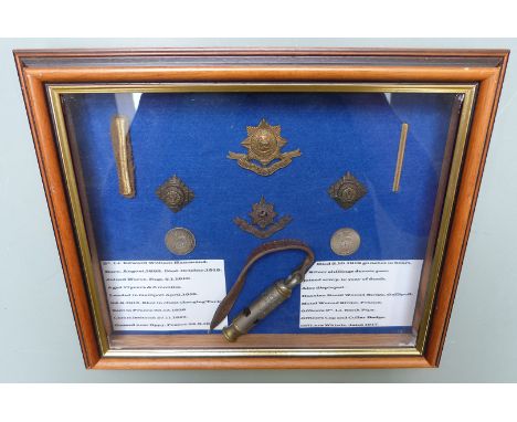 British Army WW1 whistle by A D E Courcy and Co. Frankford St together with a Worcestershire Regiment cap and collar badge wo