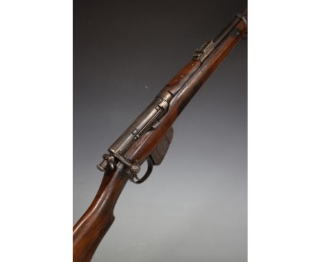 Deactivated Long Lee Enfield bolt-action rifle with bolt shield, mag lever, brass butt plate with storage compartment, adjust
