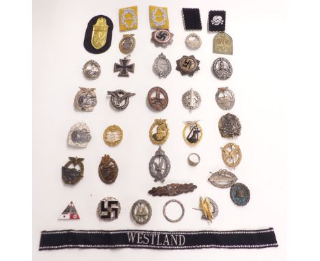 Quantity of replica Nazi German badges to include Iron Cross, Kriegsmarine, Panzer 75 and engagement badges, Luftwaffe, U boa