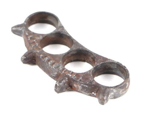 A WWI Imperial German Army Austrian made trench warfare knuckle duster, stamped 'N Steinbruck. Graz' and numbered 2108, 11cms