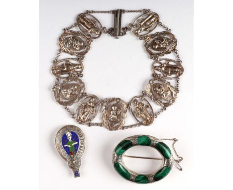A silver and enamel brooch in the form of the Alfred Jewel; together with a Scottish malachite mounted white metal oval brooc