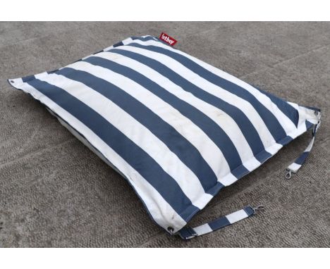 A large Fat Boy garden cushion.