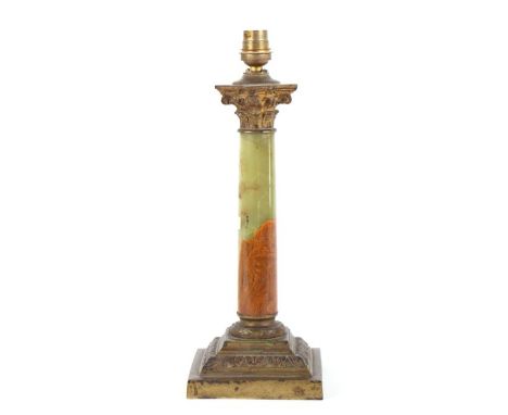 A Corinthian column table lamp with green figured marble column, on a stepped base, 33cms high.