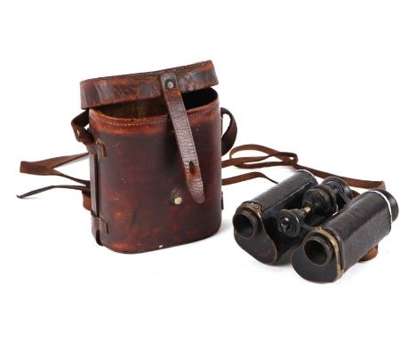 A pair of Triedr Army issue field binoculars, in a leather case.